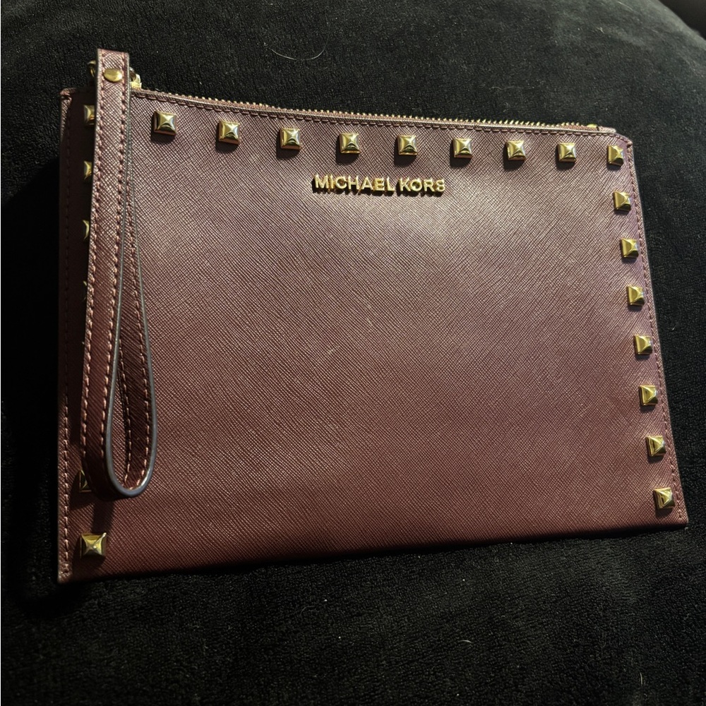 Michael Kors Large Burgundy Studded Wristlet Clutch . 7” H x 9.5” L